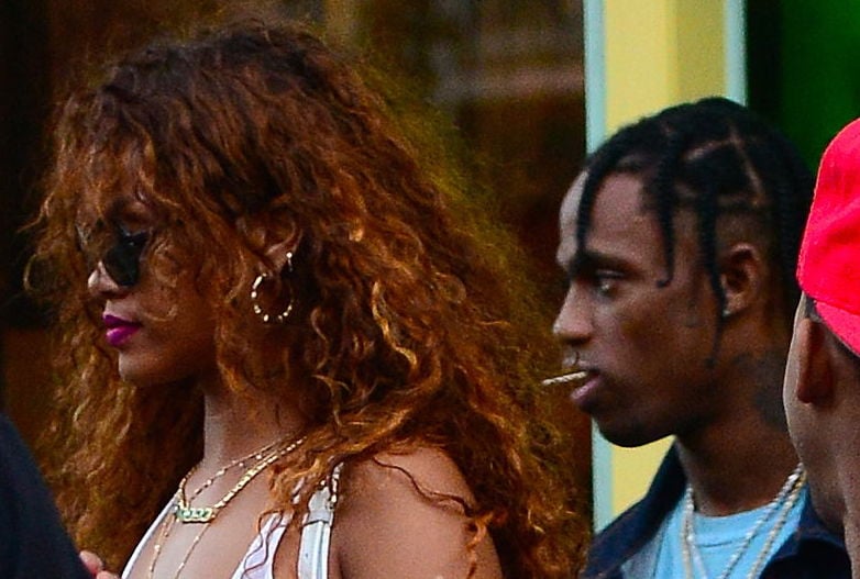 Rihanna and Travis Scott leaving a restaurant in August 2015