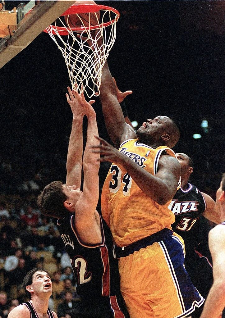 Shaquille O'Neal of the Los Angeles Lakers attempts a dunk against News  Photo - Getty Images