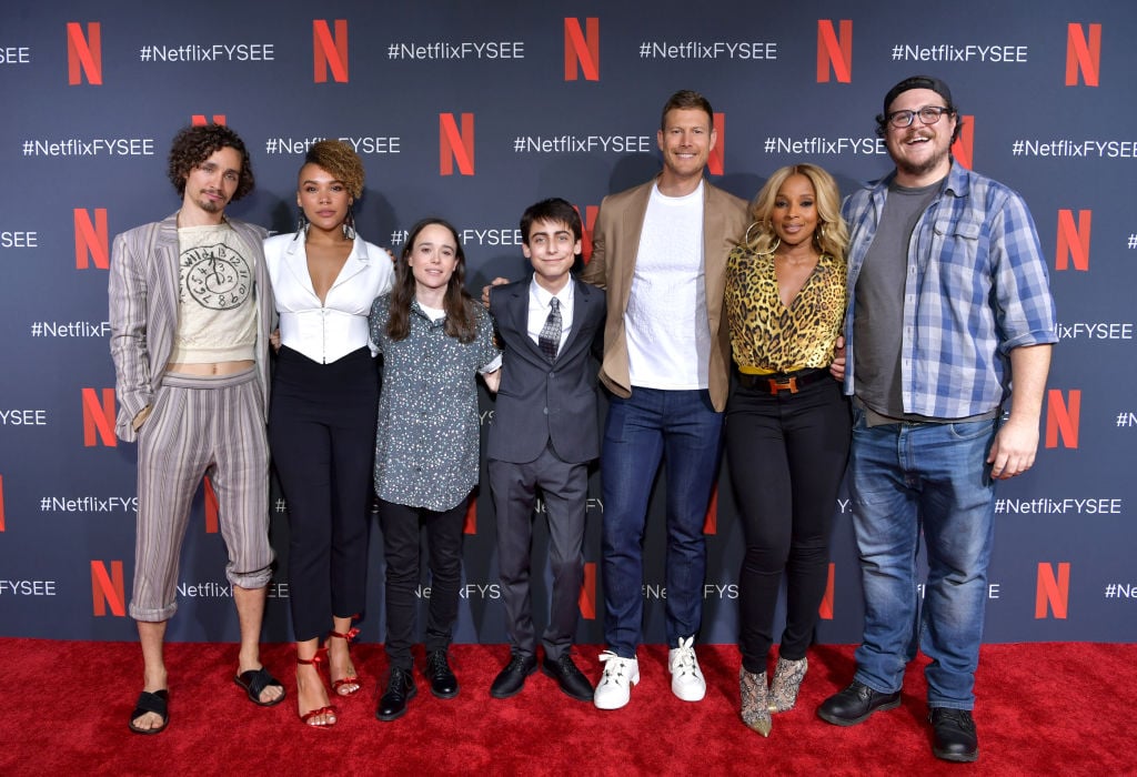 Robert Sheehan, Emmy Raver-Lampman, Ellen Page, Aidan Gallagher, Tom Hopper, Mary J. Blige and Cameron Britton attend Netflix's 'Umbrella Academy' Screening at Raleigh Studios on May 11, 2019 in Los Angeles, California.