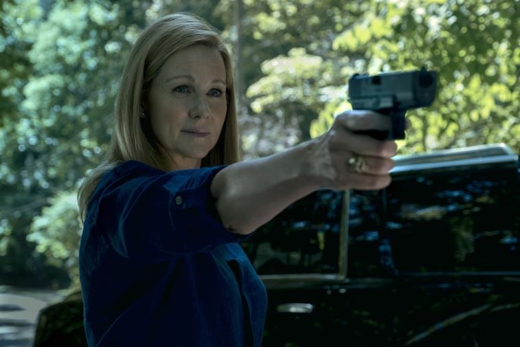 Laura Linney as Wendy Byrde pointing a gun in 'Ozark'