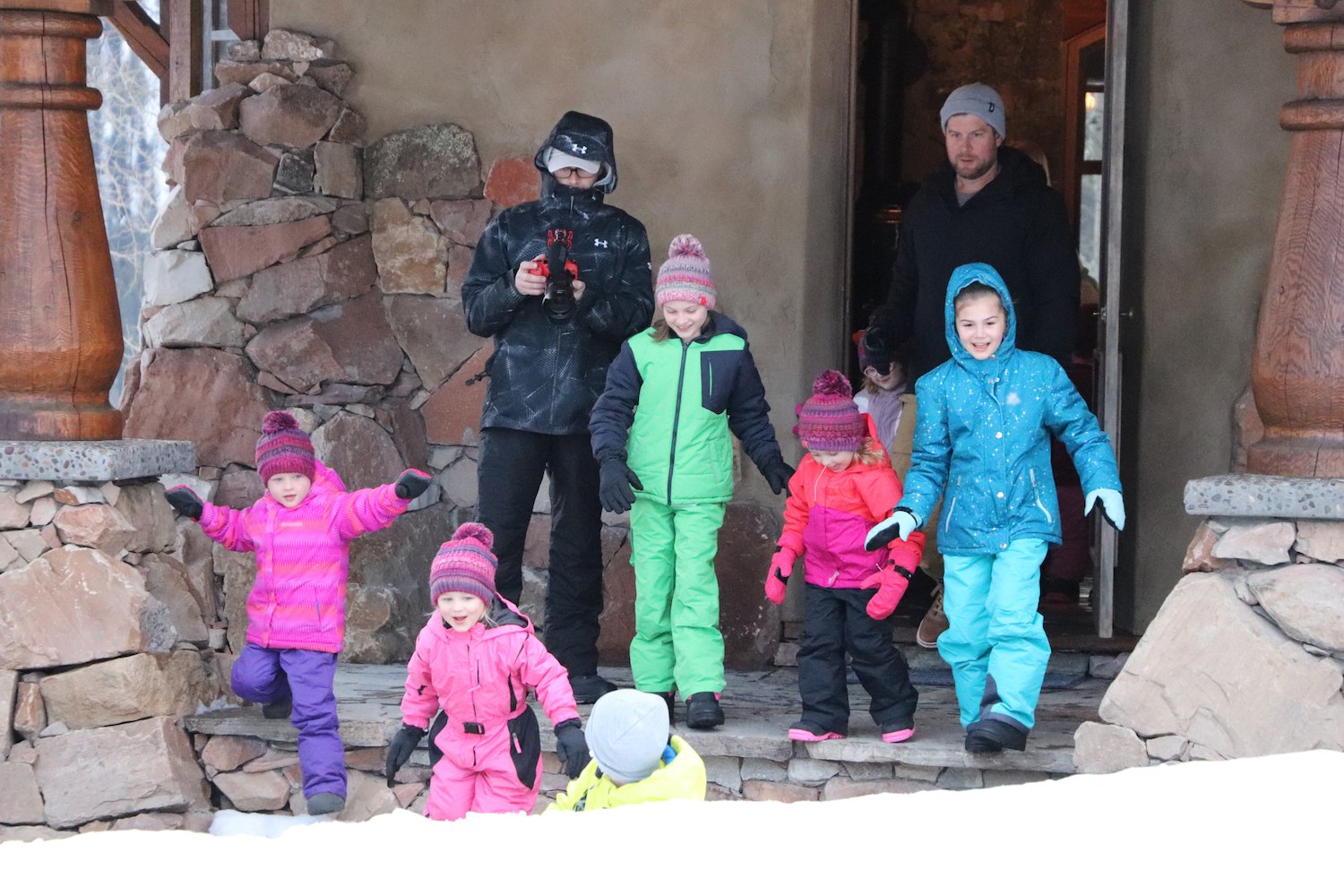 The Busby girls prepare to play in the snow