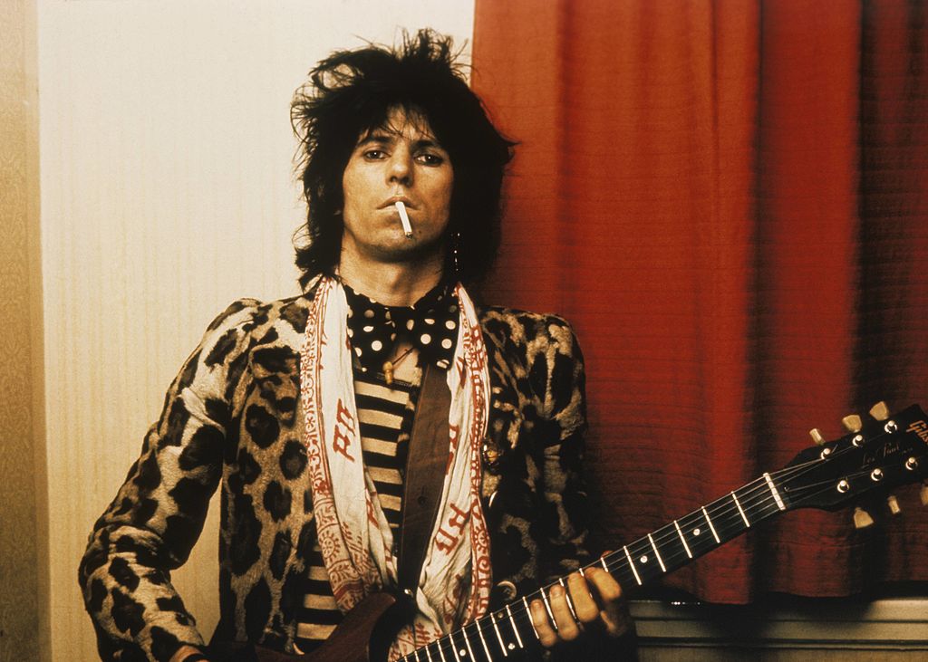 Keith Richards wearing a cheetah print jacket