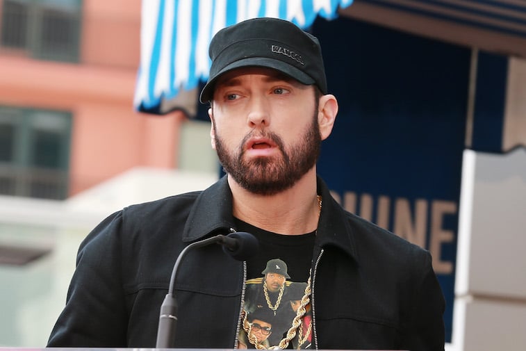 Eminem speaks at a ceremony