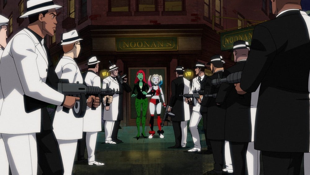 Poison Ivy and Harley Quinn are ambushed by Two-Face's men.