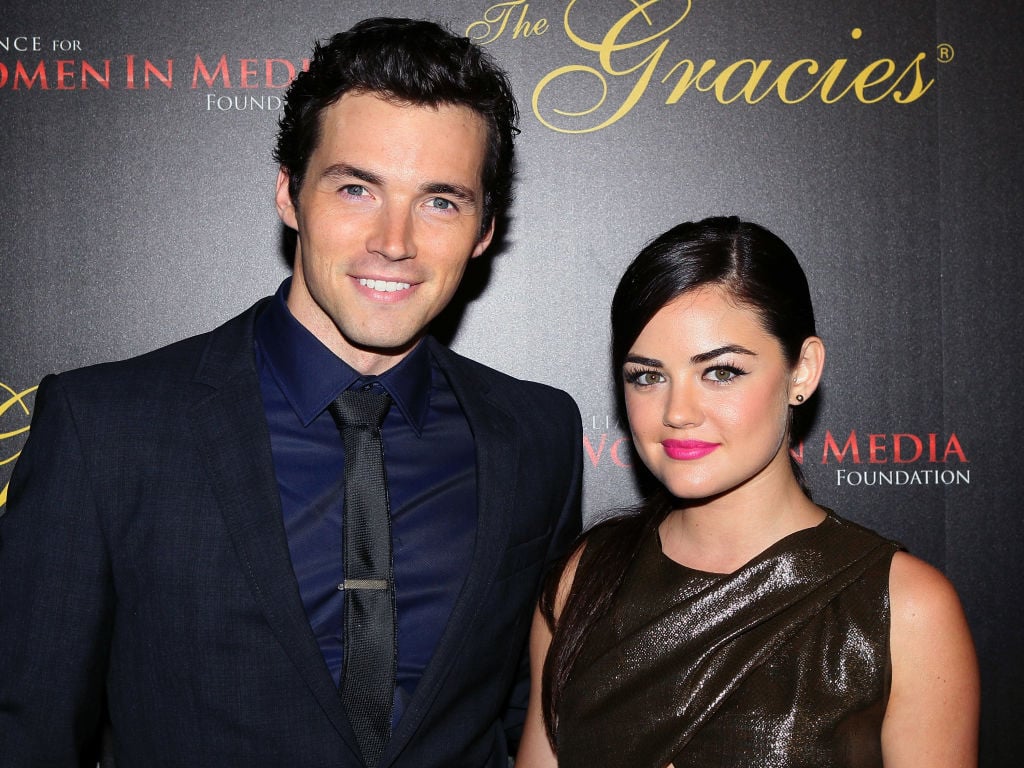 Ian Harding (L) and Lucy Hale attend the 38th Annual Gracie Awards Gala at The Beverly Hilton Hotel on May 21, 2013 in Beverly Hills, California.