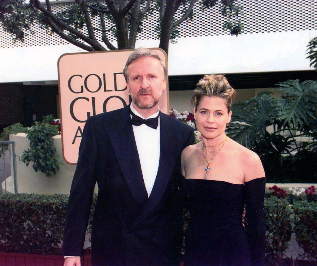 Portrait of married couple, director James Cameron and actress Linda Hamilton, as they pose together at the Beverly Hilton Hotel during the 55th Golden Globe Awards, Los Angeles, California, January 18, 1998. 