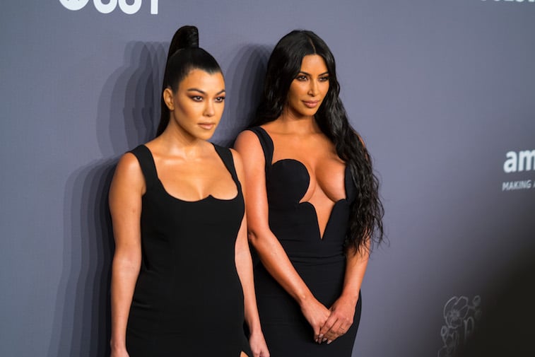 Kourtney Kardashian and Kim Kardashian West on the red carpet