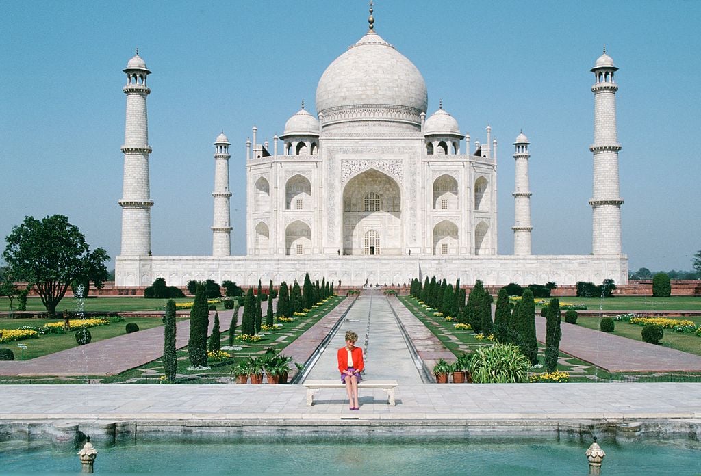 Princess Diana sits in front of the Taj Mahal during a visit to India