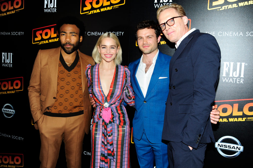 Donald Glover, Emilia Clarke, Alden Ehrenreich, and Paul Bettany pose at a screening for 'Solo: A Star Wars Story' 