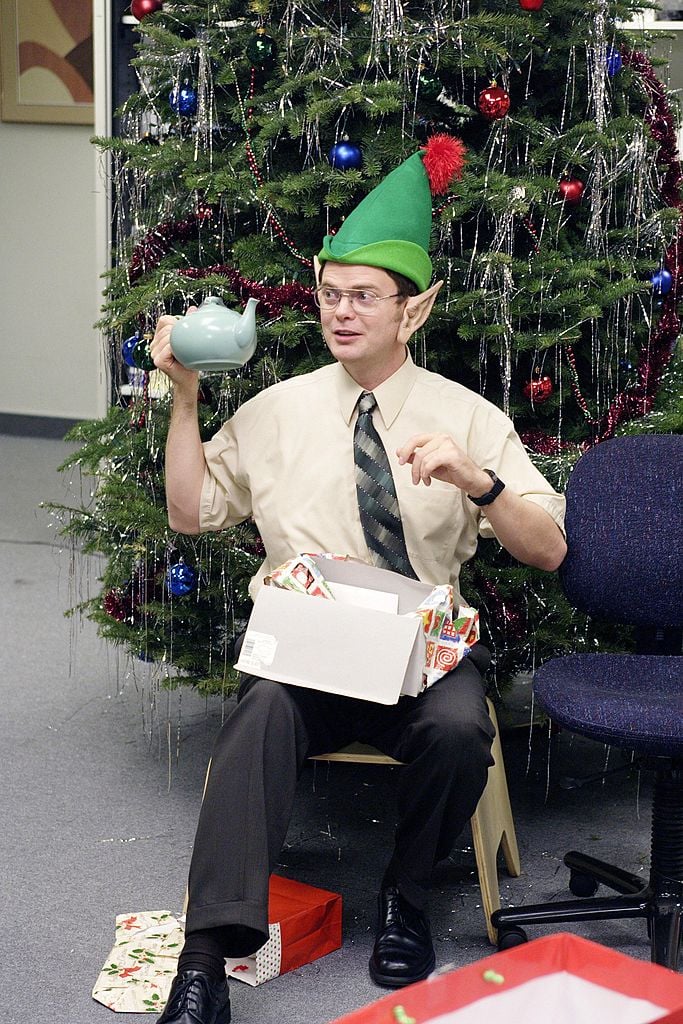 'The Office' scene from 'The Christmas Party' Rainn Wilson as Dwight Schrute holding a teapot