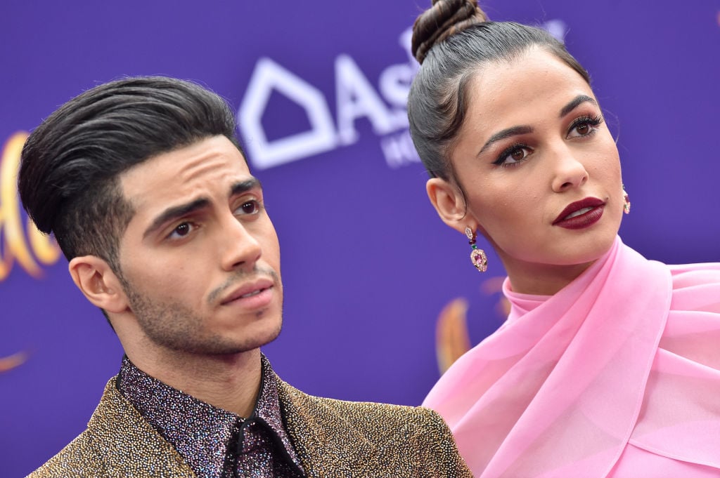 Mena Massoud and Naomi Scott attend the premiere of Disney's 'Aladdin'