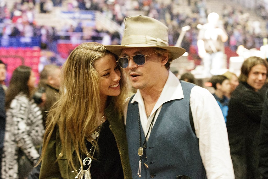 Johnny Depp and Amber Heard at Rodeo Austin at the Travis County Expo Center on March 9, 2014 