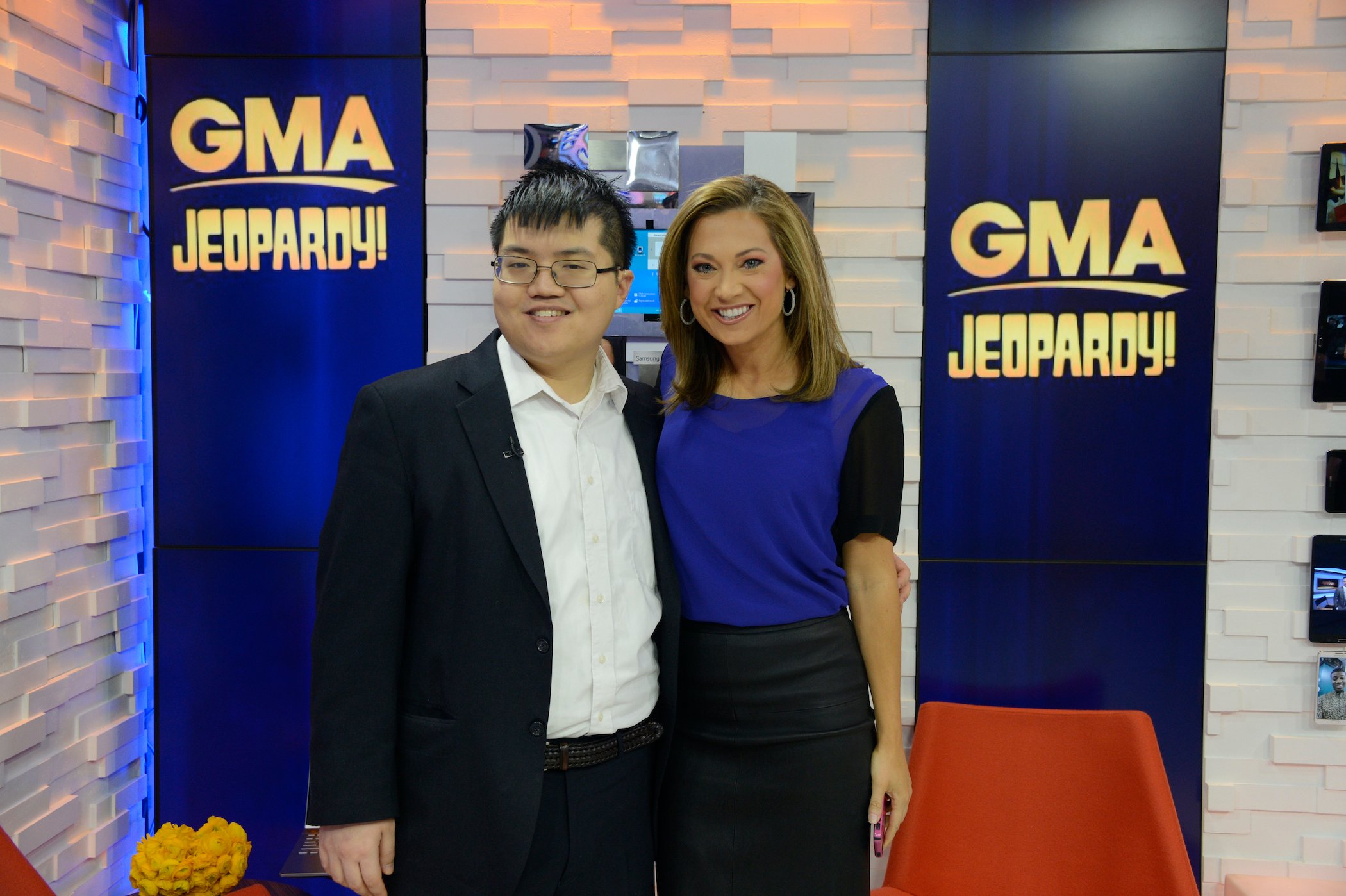 Arthur Chu poses with Ginger Zee on 'Good Morning America'