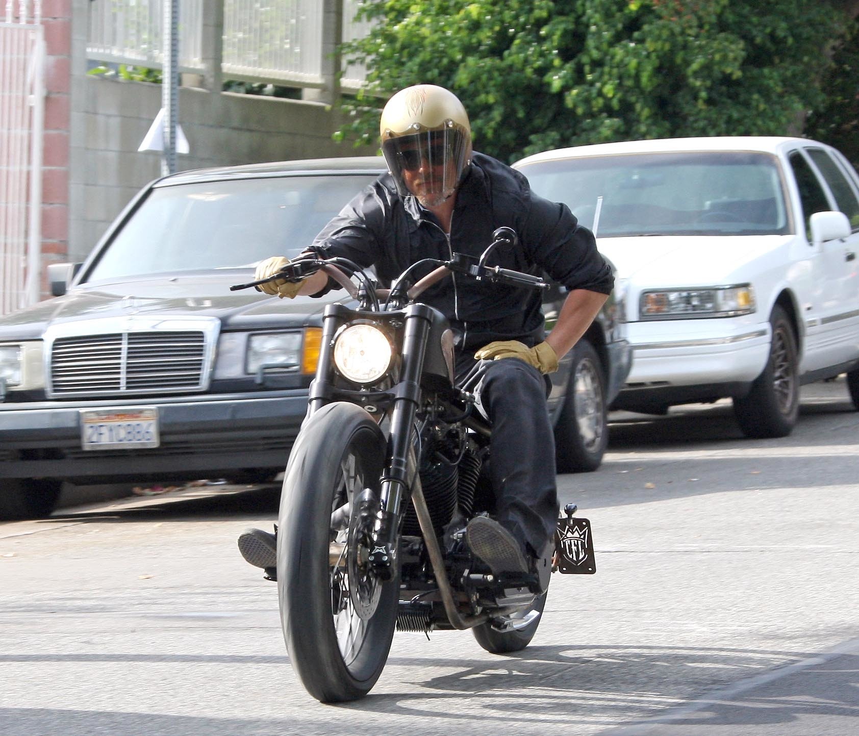 Brad Pitt riding his customized motorcycle
