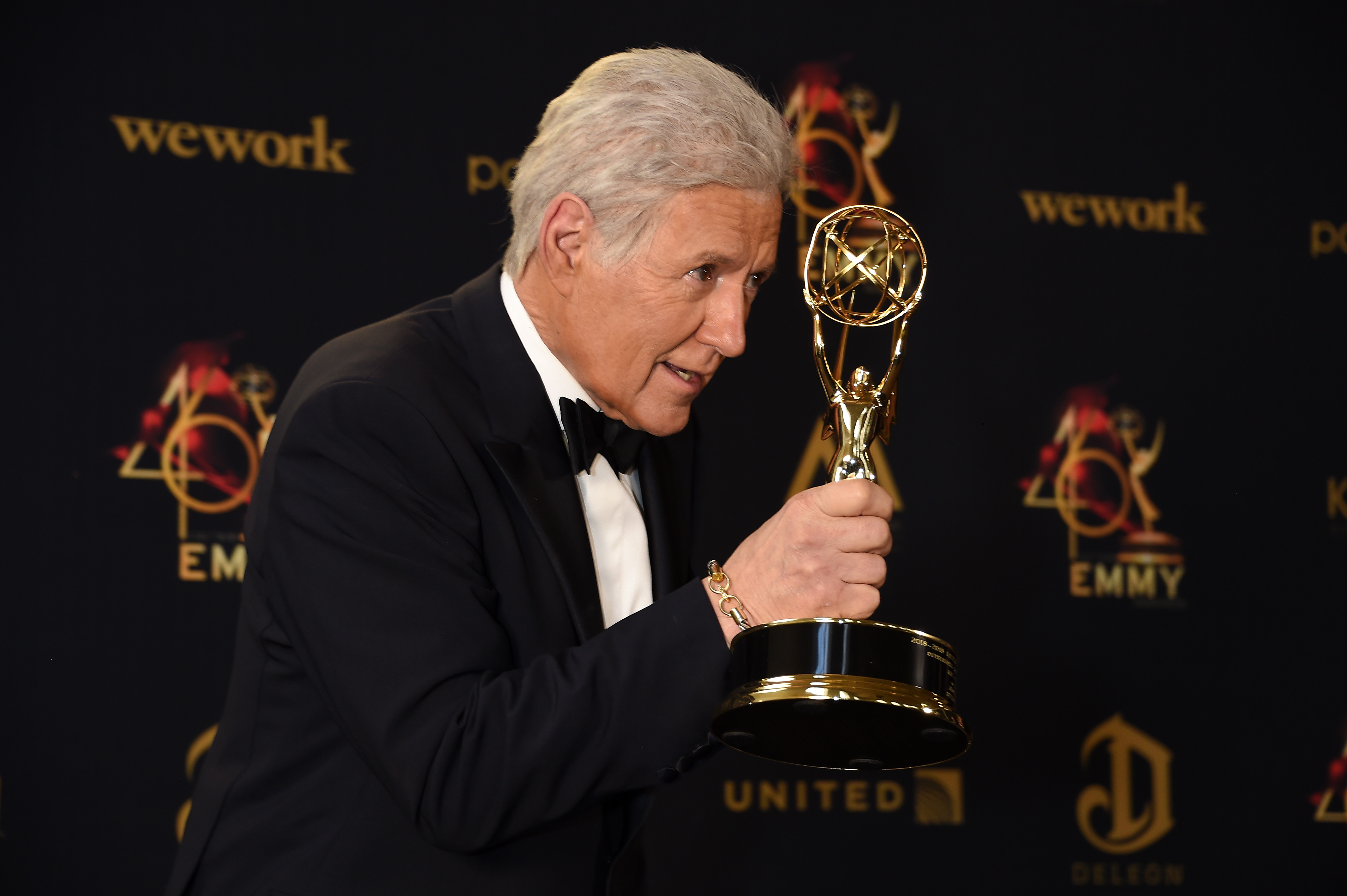 Alex Trebek accepting a Daytime Emmy award at the 2019 ceremony