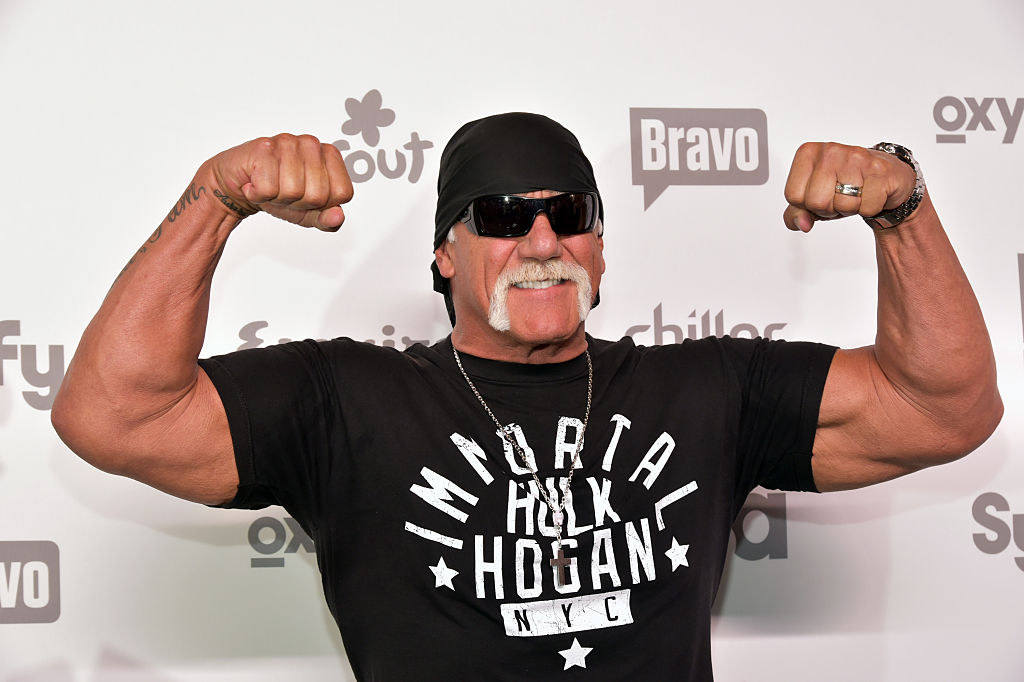 Hulk Hogan flexing  at a red carpet event