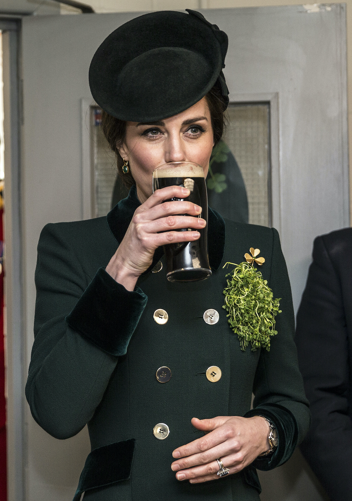 Kate Middleton takes a sip of Guinness at a St. Patrick's Day Parade