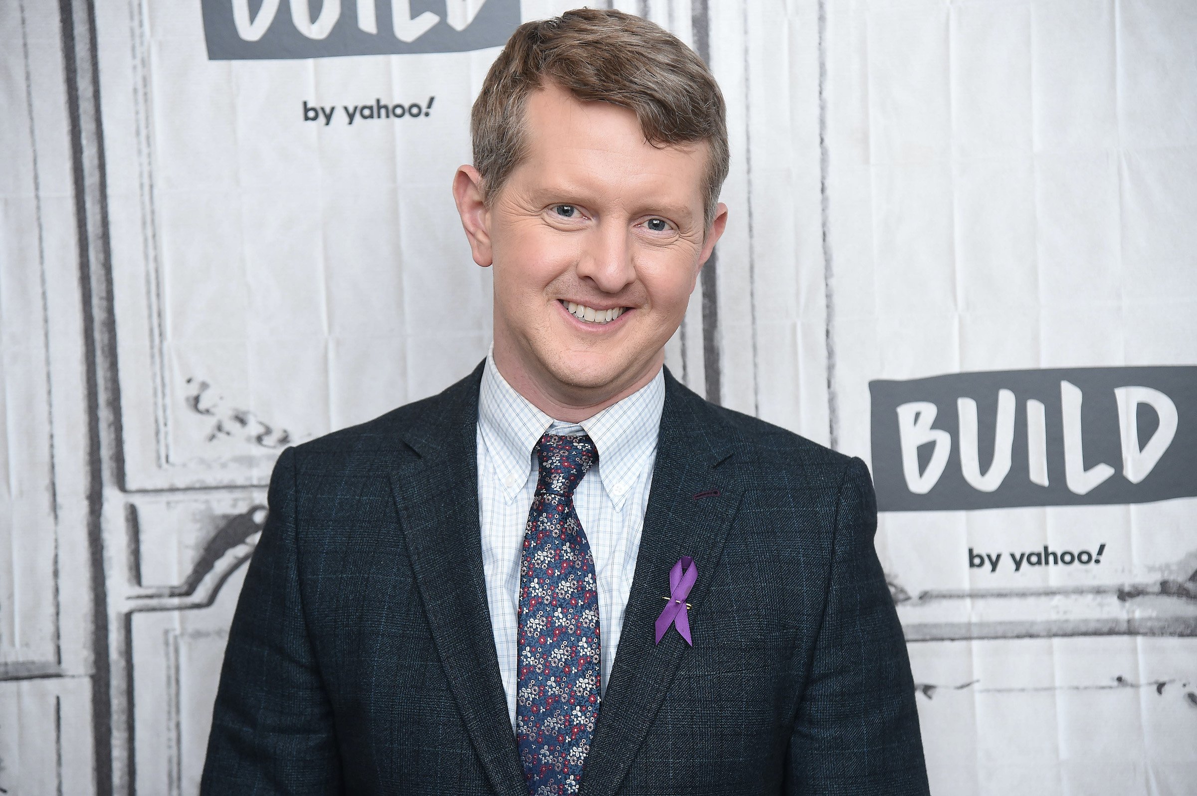 Ken Jennings poses for cameras during a visit to the Build Series