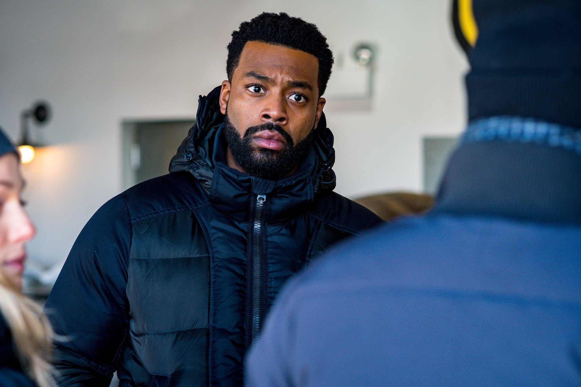 LaRoyce Hawkins as Office Kevin Atwater on 'Chicago P.D.' wearing a black winter jacket, looking away from the camera
