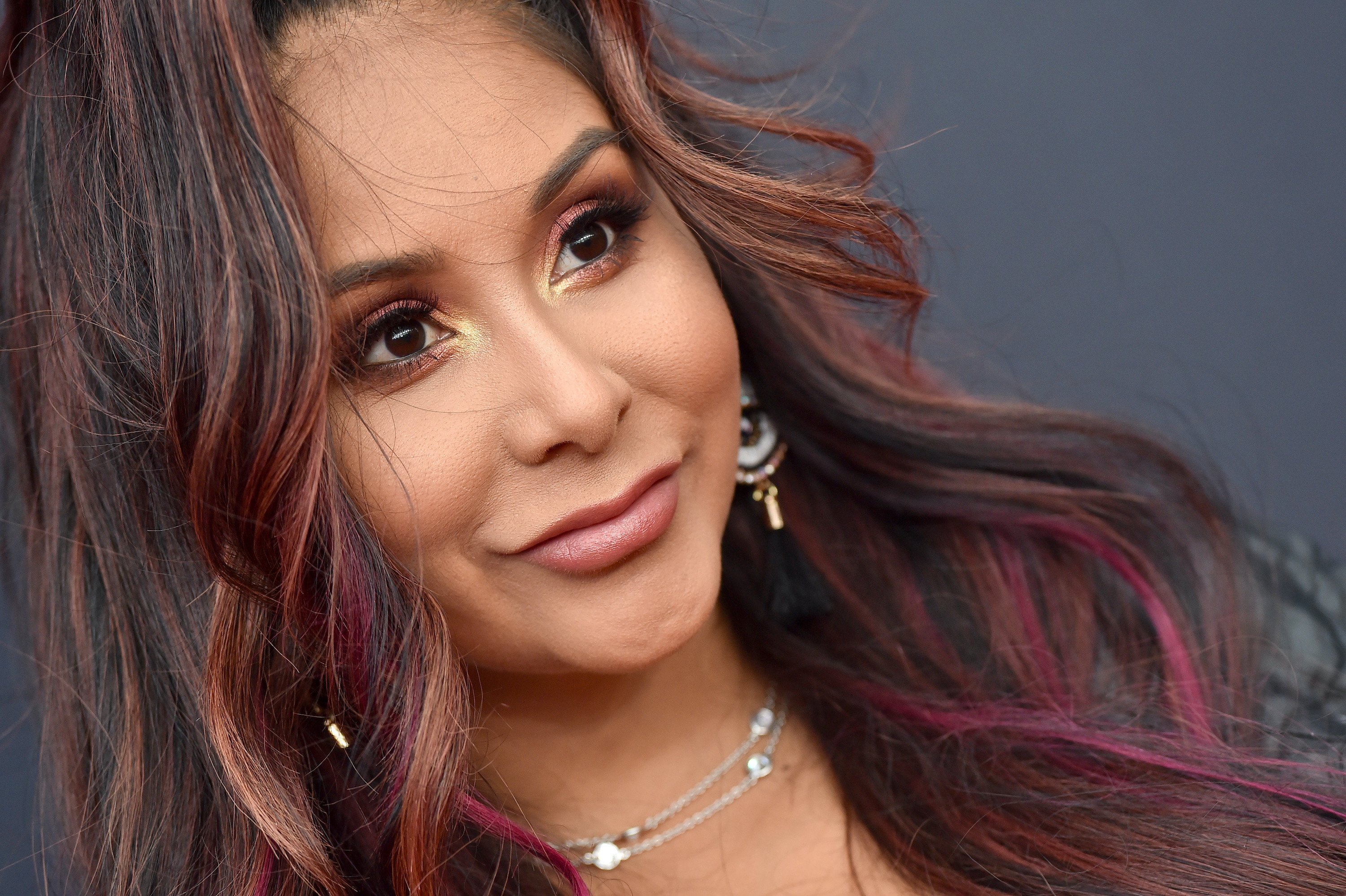 Close up photo of Nicole 'Snooki' Polizzi from the red carpet at the 2019 MTV Video Music Awards