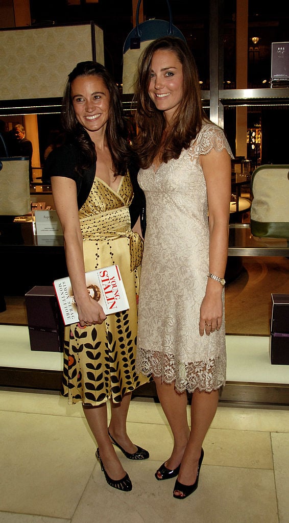 Pippa Middleton and Kate Middleton attend a book launch party