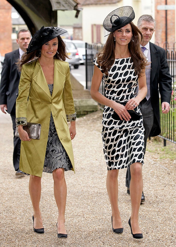 Pippa Middleton and Kate Middleton attend a wedding in 2011