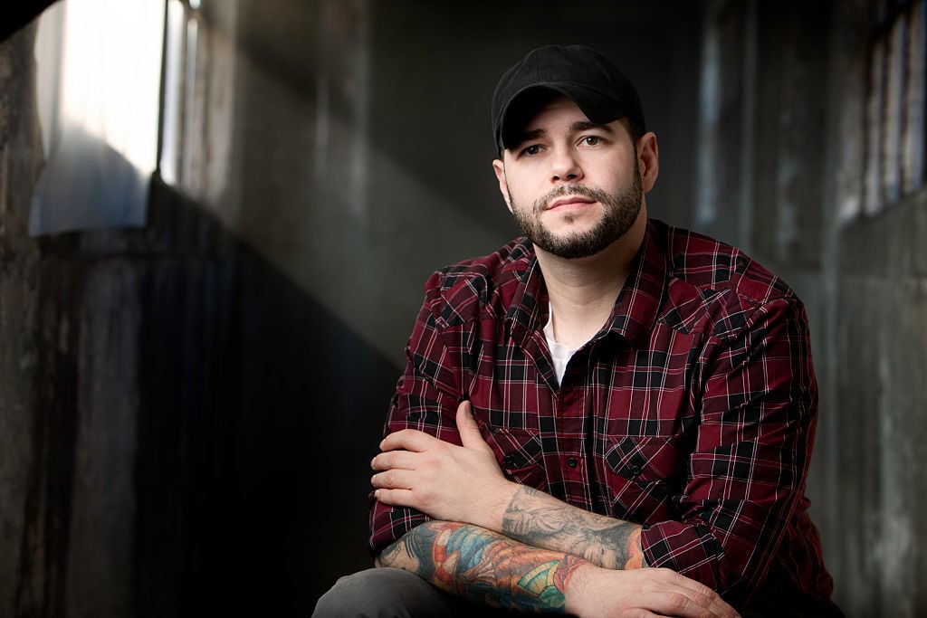 Steve Gonsalves sitting, looking toward the camera