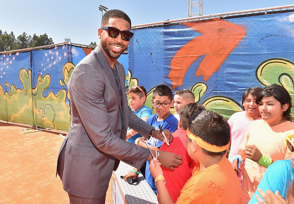 Tristan Thompson signing autographs for kids