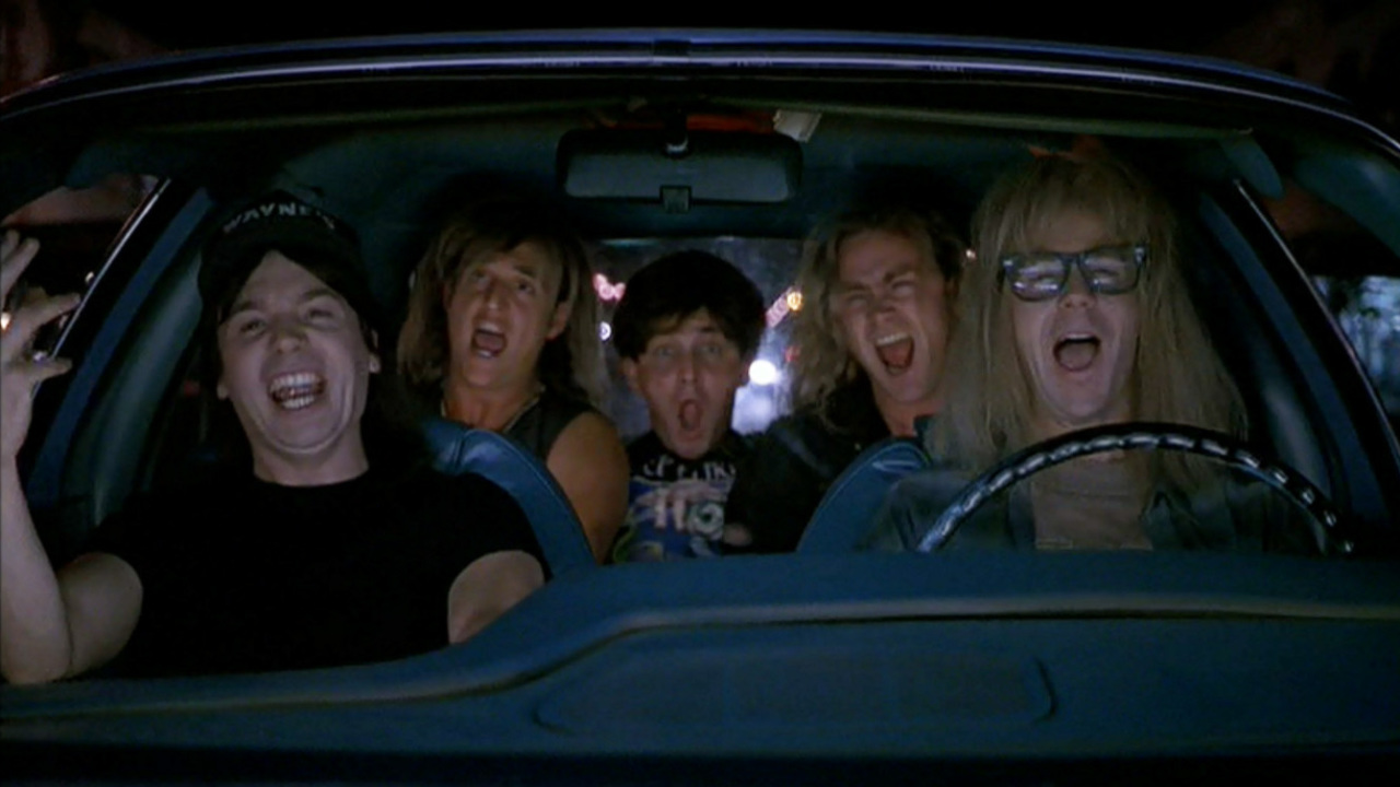From ‘Iron Man 2’ to ‘Wayne’s World’: 7 Amazing Movie Moments Featuring Queen Songs