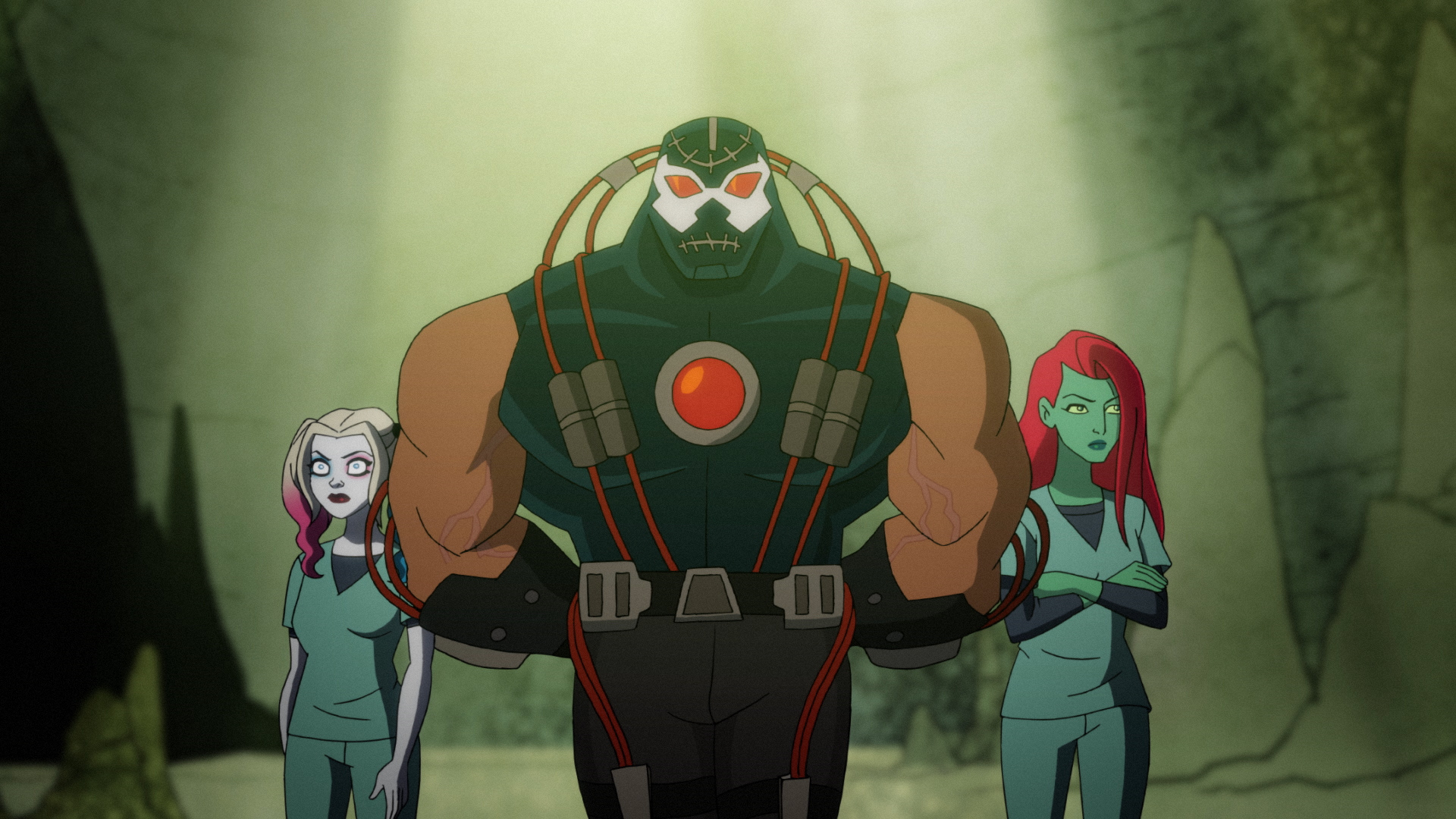 Bane shows the new pit prison to Harley Quinn and Poison Ivy