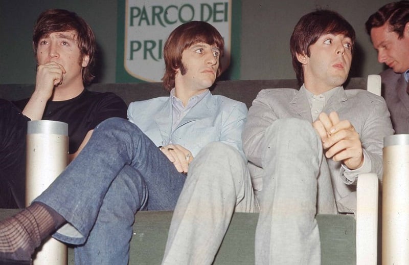 Ringo Starr sits between John Lennon and Paul McCartney in 1965