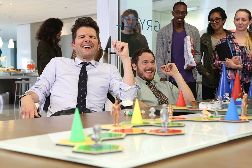 Ben Wyatt (Adam Scott) and Andy Dwyer (Chris Pratt) play Cones of Dunshire at Gryzzl in Season 6, Episode 21, "Moving Up" of 'Parks and Recreation.' 