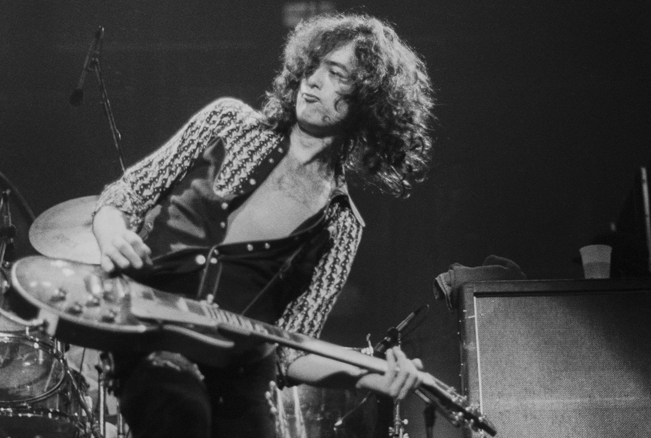 Jimmy Page plays on stage