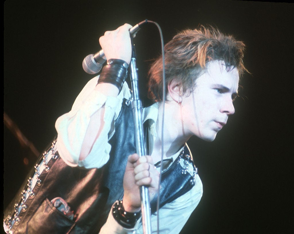 The Sex Pistols' Johnny Rotten with a microphone