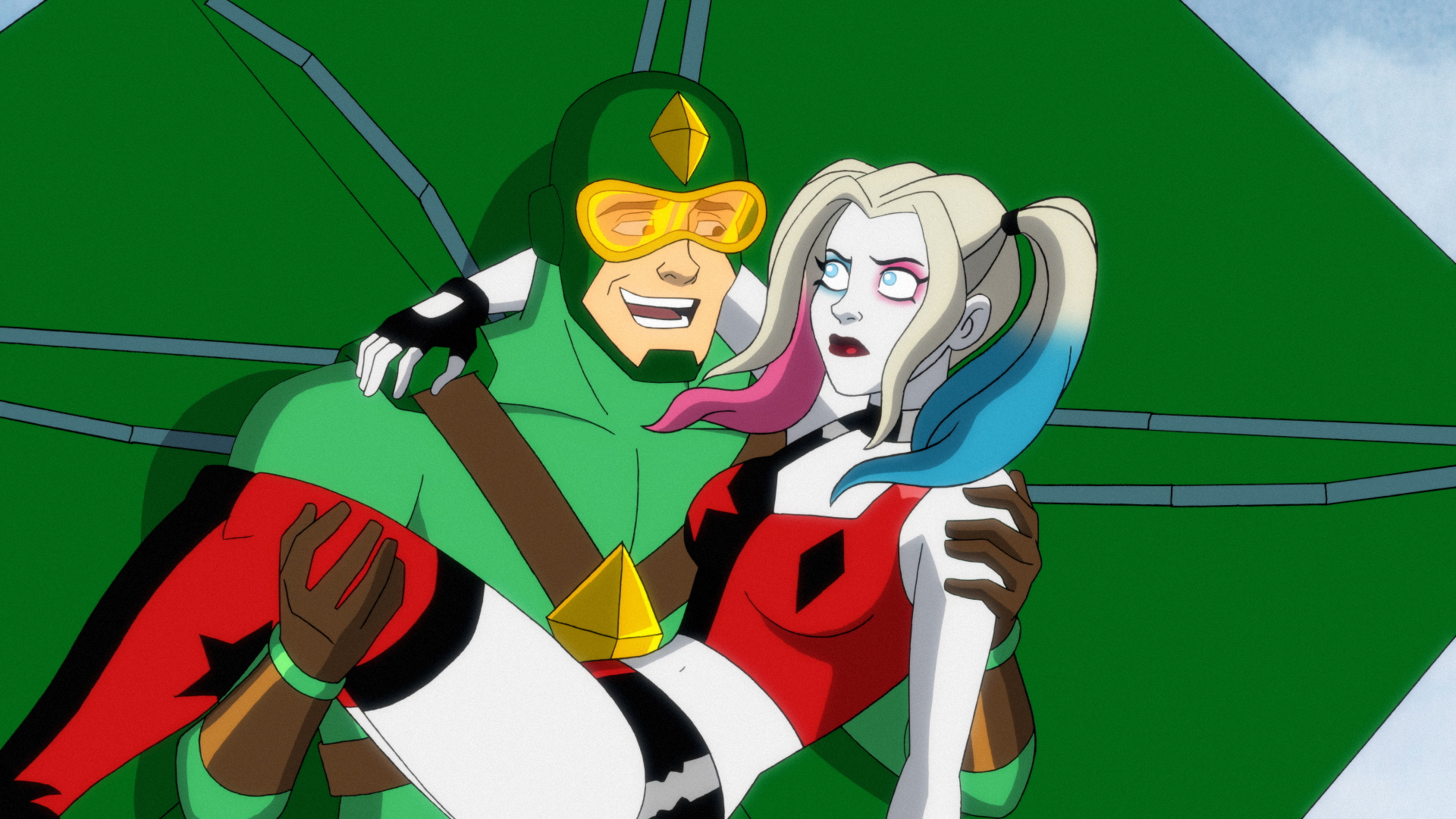Kiteman carries Harley Quinn away from a mind-controlled Poison Ivy