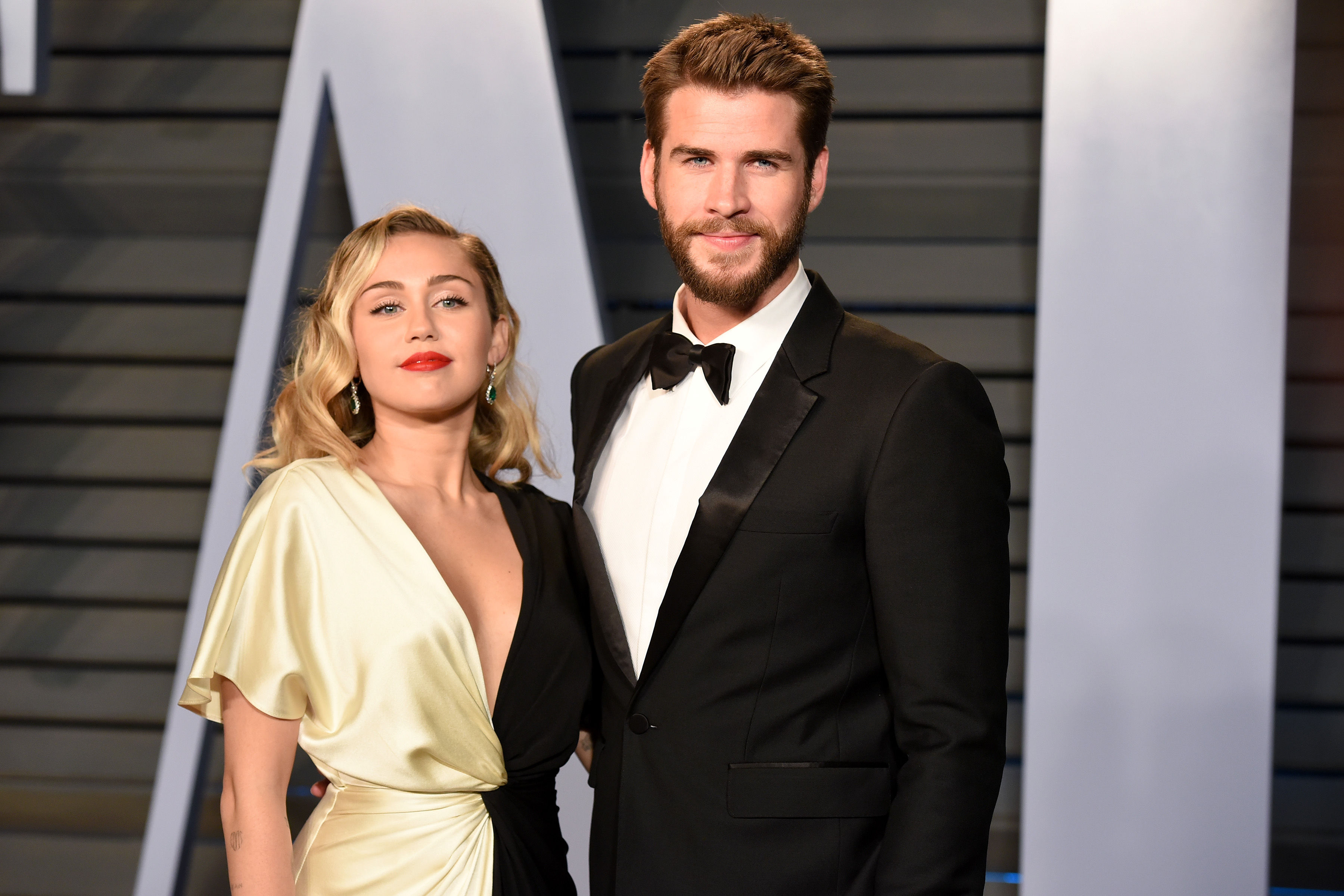 Miley Cyrus and Liam Hemsworth attend the 2018 Vanity Fair Oscar Party on March 4, 2018 in Beverly Hills, CA.  