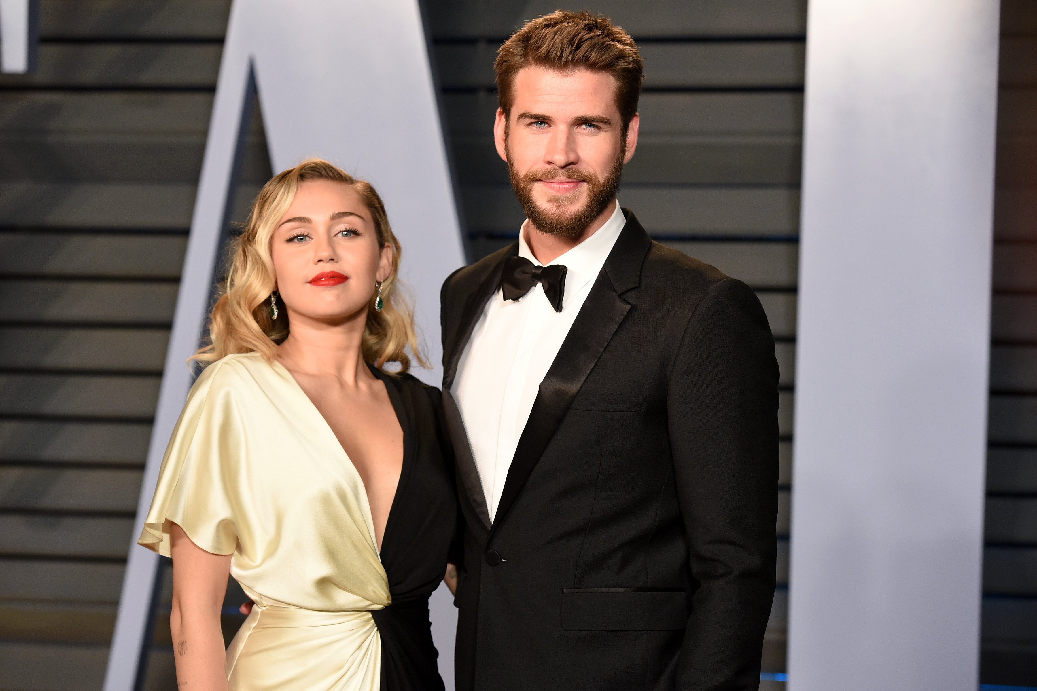 Miley Cyrus and Liam Hemsworth attend the 2018 Vanity Fair Oscar Party on March 4, 2018 in Beverly Hills, CA.