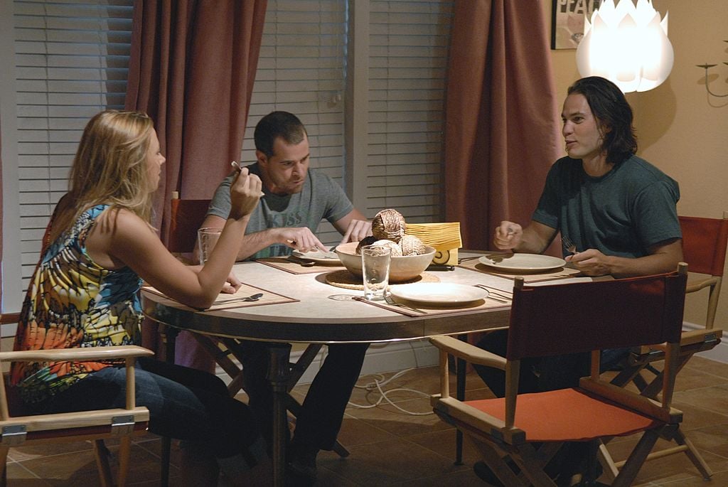 Mindy, Billy and Tim Riggins at dinner table