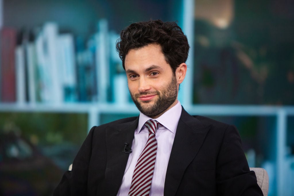 Penn Badgley wearing a suit and tie
