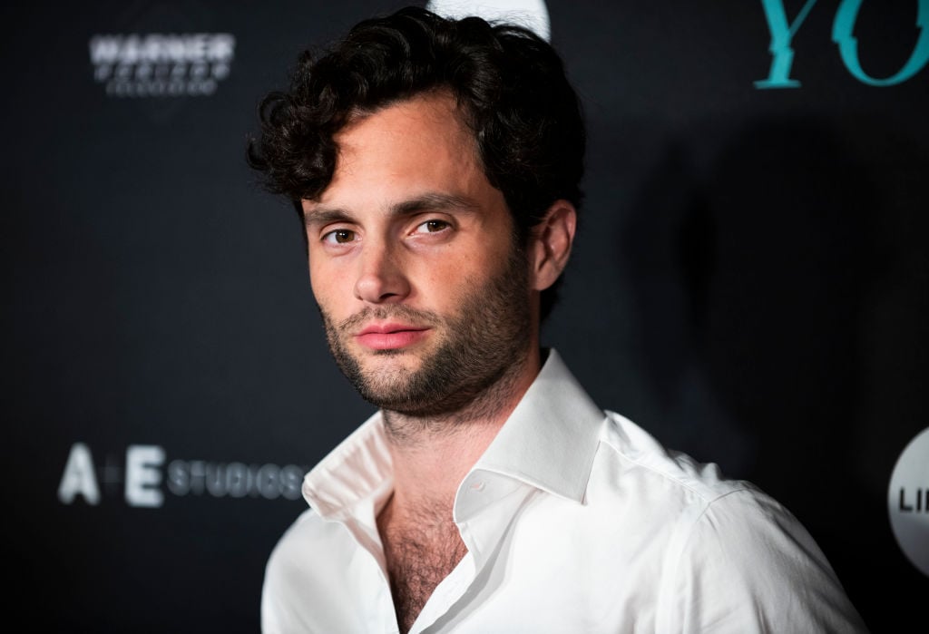 Penn Badgley wearing a white shirt