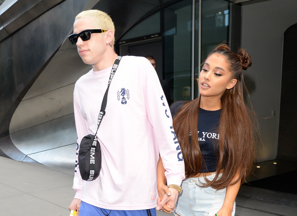 Singer Ariana Grande (R) and Pete Davidson are seen walking in Midtown on July 11, 2018 in New York City.