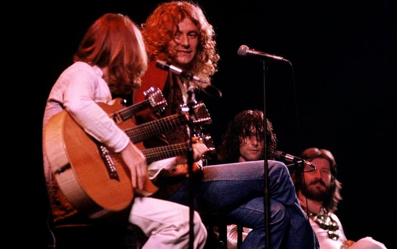 Led Zeppelin seated onstage in 1977