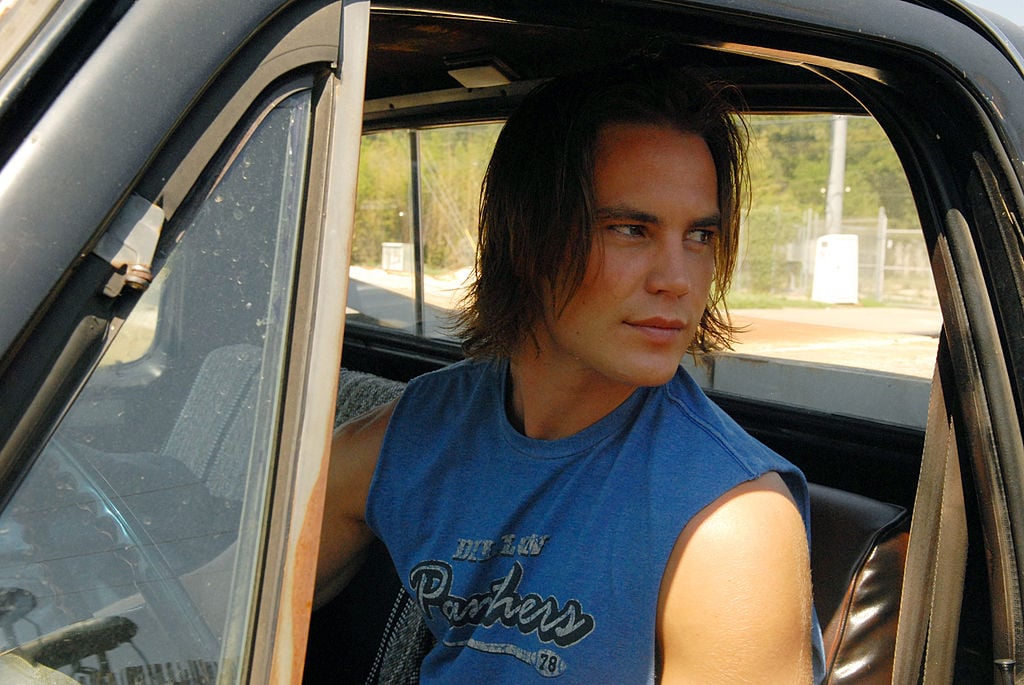 Tim Riggins in a truck