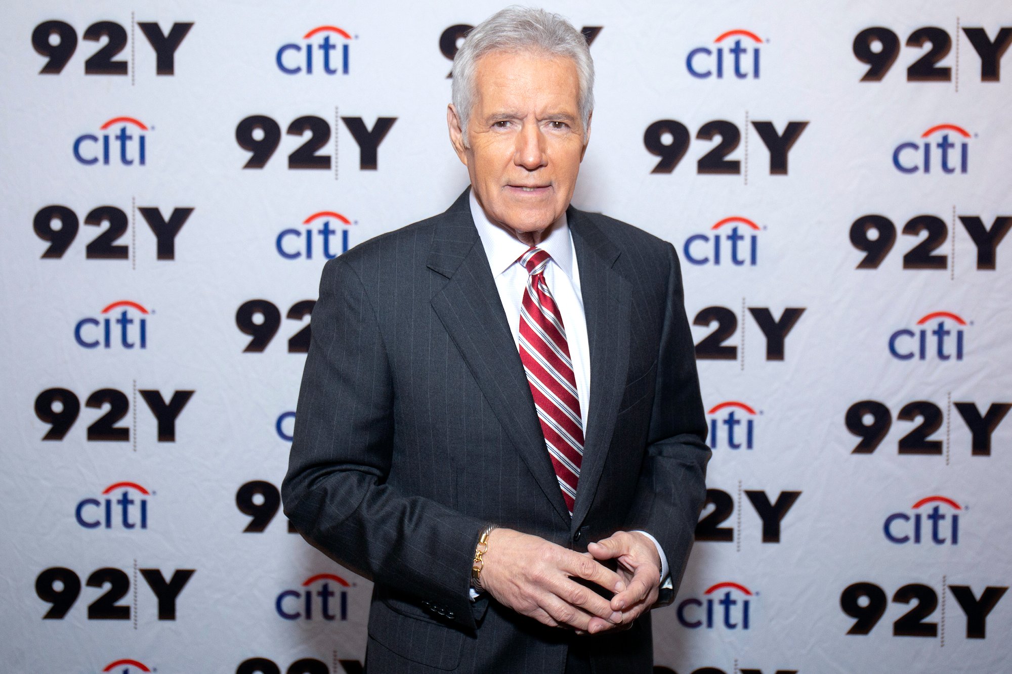 Alex Trebek poses for cameras attending 'Who is Alex Trebek? Celebrating 35 seasons of Jeopardy!' in 2019