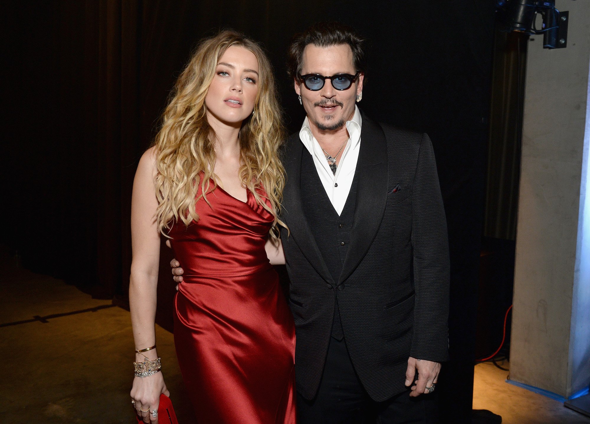 Amber Heard and Johnny Depp smiling