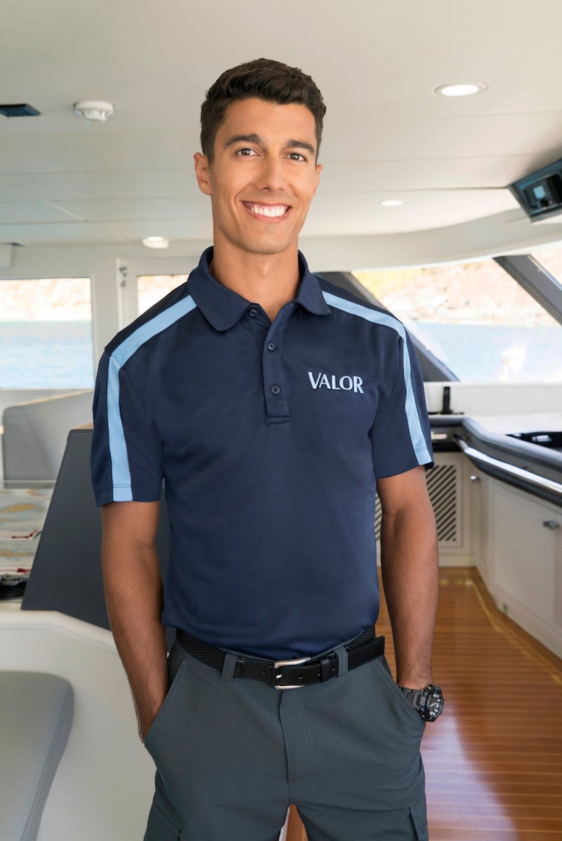 Bruno Duarte posing on a yacht for Below Deck Season 5