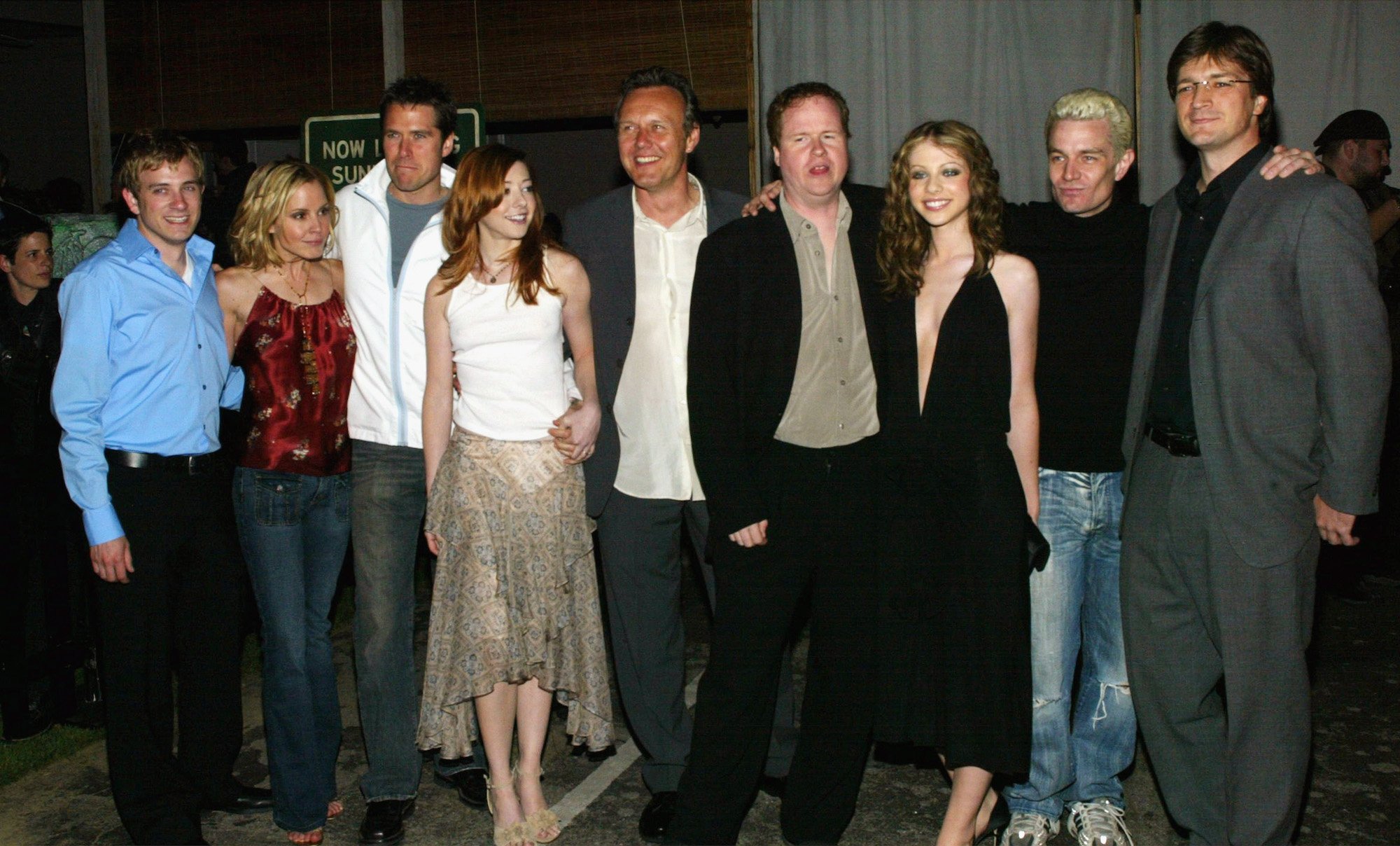 'Buffy the Vampire Slayer' season 7 cast with Joss Whedon, smiling in different directions