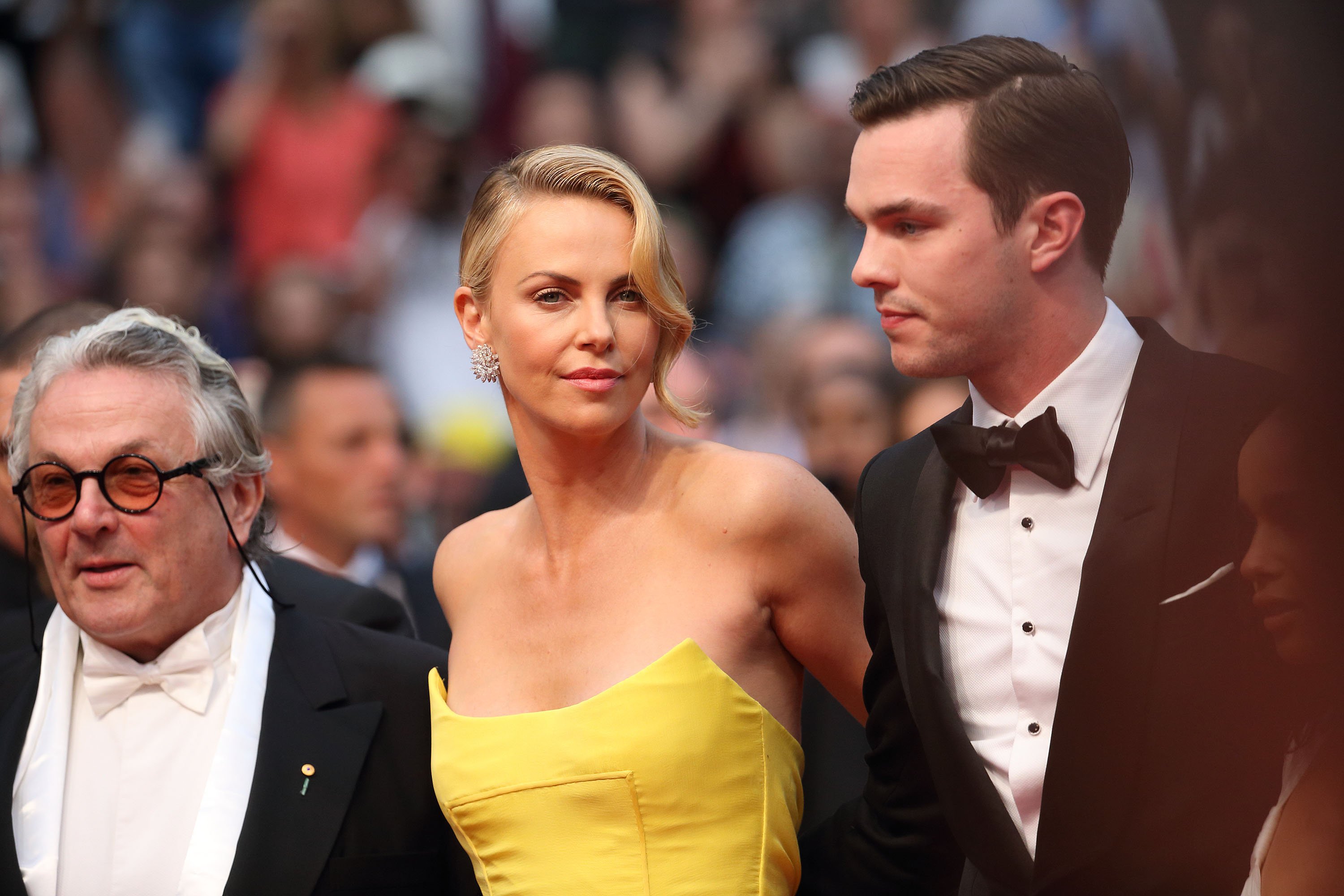 Charlize Theron and Nicholas Hoult attend the "Mad Max : Fury Road" Premiere