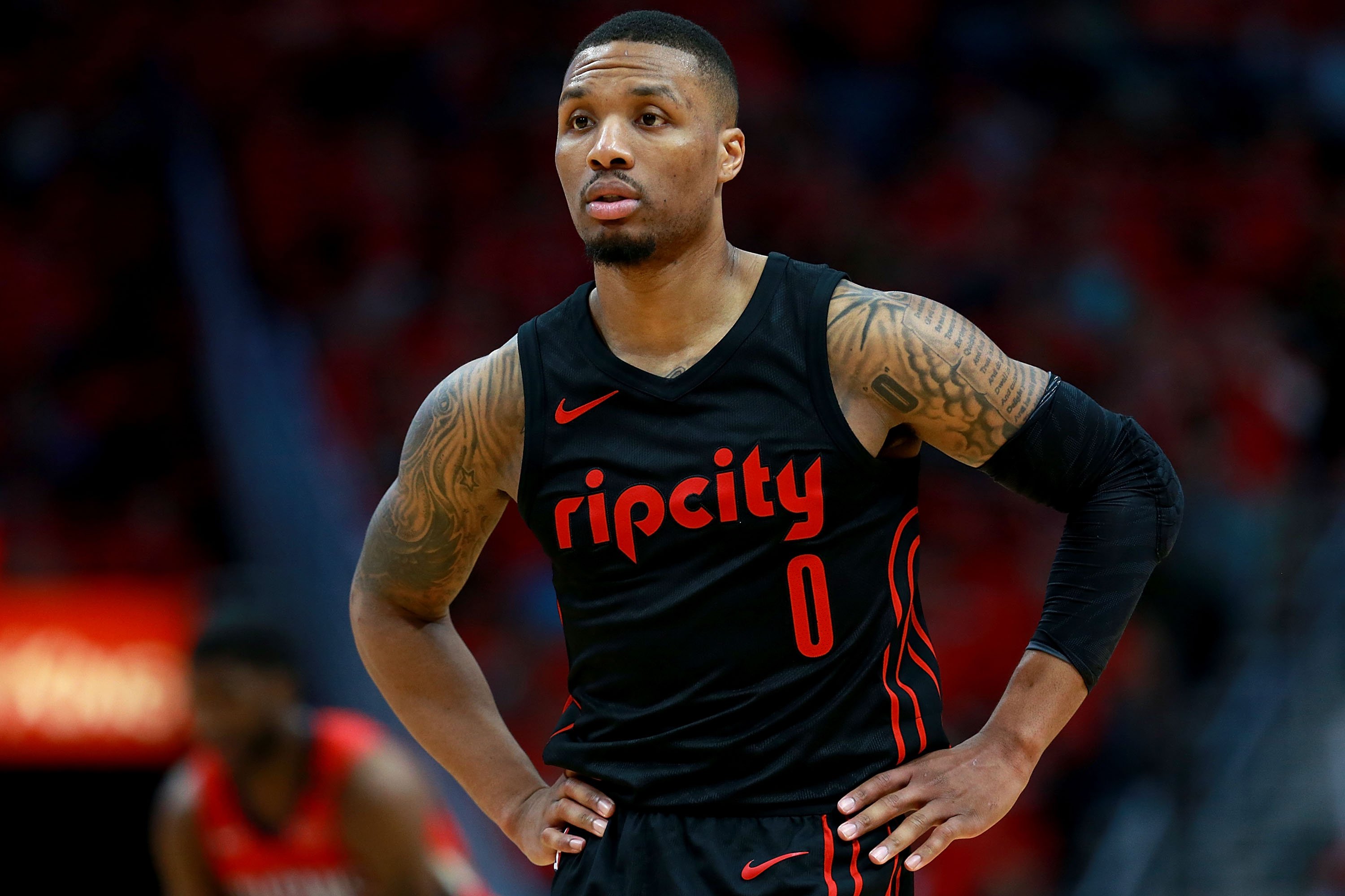 Damian Lillard looking on during an NBA game