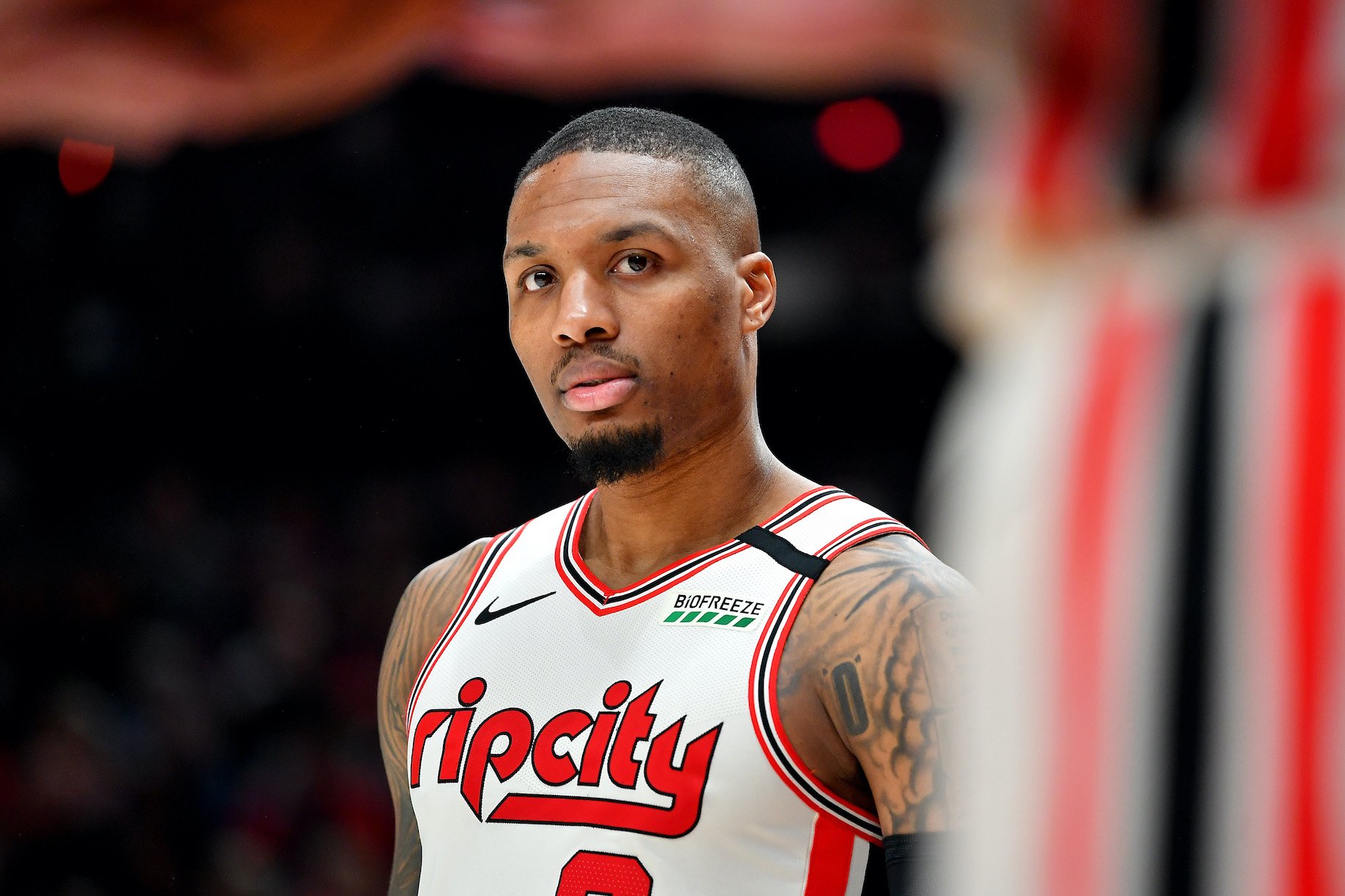Damian Lillard #0 of the Portland Trail Blazers looks on during the second half of the game against the Washington Wizards at the Moda Center on March 04, 2020
